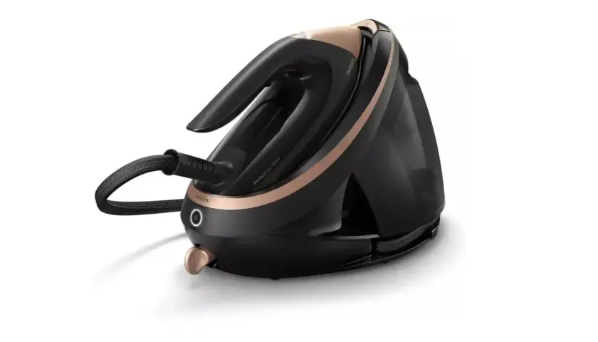 Czarny generator pary Philips PerfectCare 9000, lider w rankingu żelazek parowych, z miedzianymi detalami.